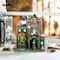 Glitzhome® 11"H Lighted Resin Halloween Haunted House Village